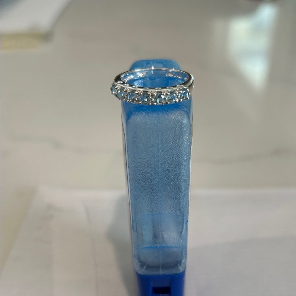 Silver Ring with Light Blue Gemstones